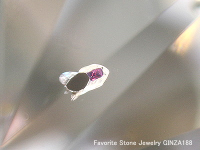 Diamond loose with garnet inclusions 1.400ct